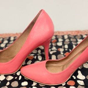 Coral orange pumps heels